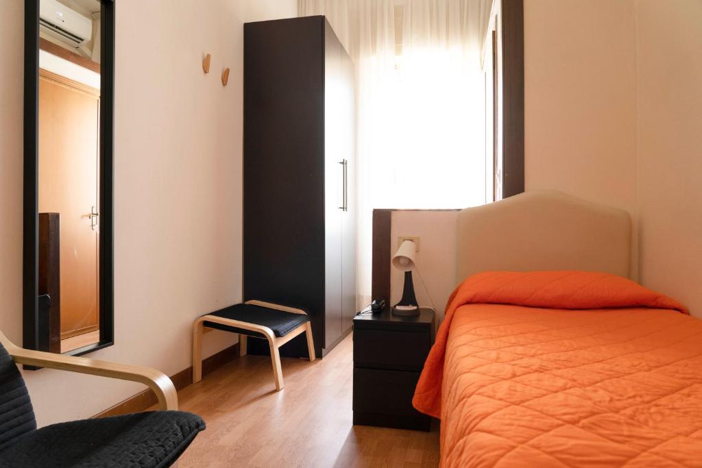 Postel nebo postele na pokoji v ubytování Albergo San Lorenzo