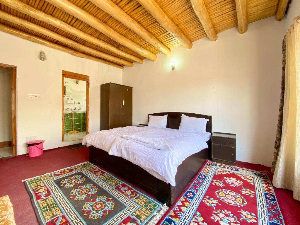 Postel nebo postele na pokoji v ubytování Sumrolee Guest House