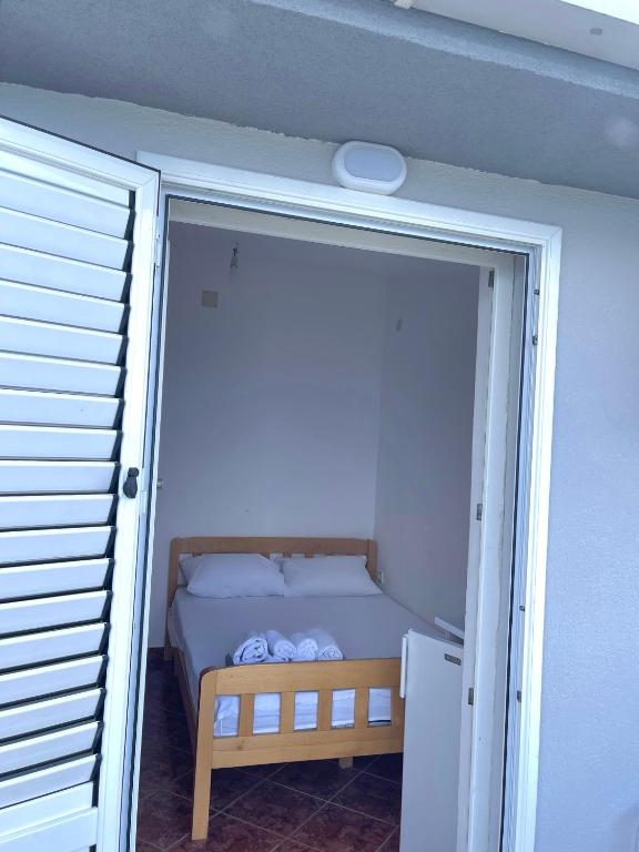 Una cama o camas en una habitación de Kuća Radović