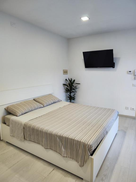 Postel nebo postele na pokoji v ubytování Appartamento La Terrazza - Paratico -