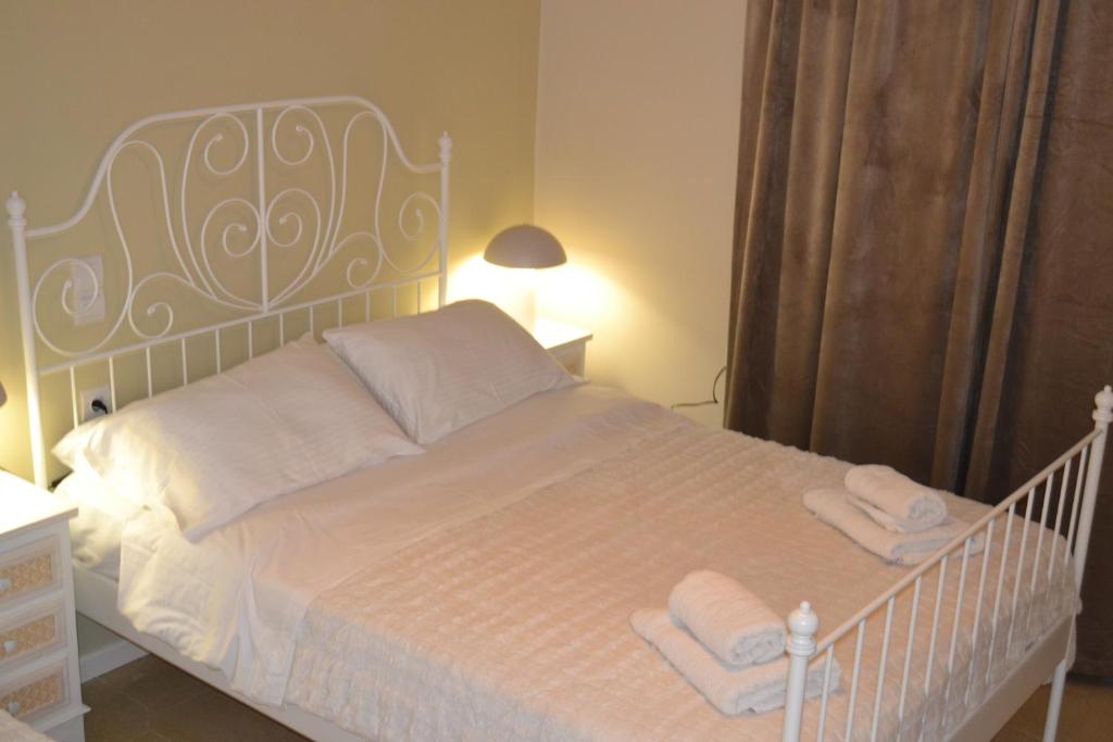 Postel nebo postele na pokoji v ubytování Margarita rooms