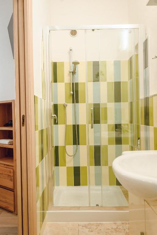 Koupelna v ubytování SUITES DELUXE FRONT SEA, Domus Lumeras
