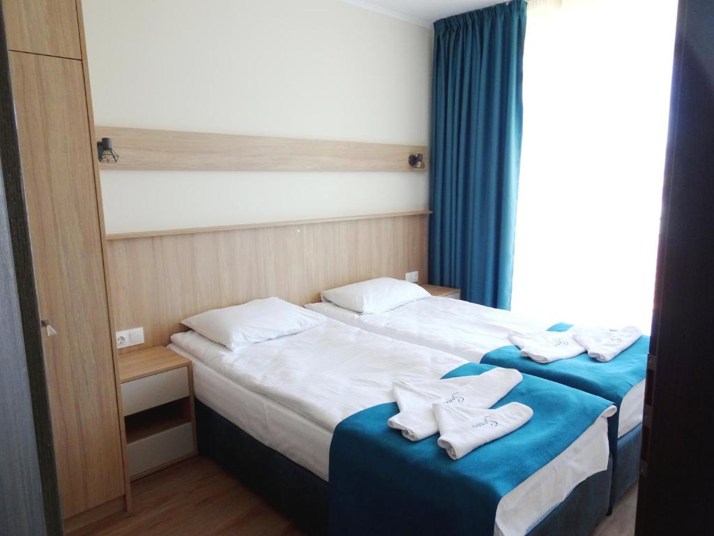 Postel nebo postele na pokoji v ubytování Hotel Samara with Relax area