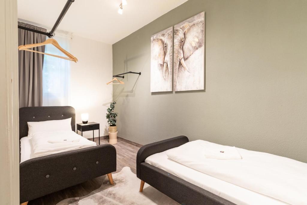 Familienfreundliche Stadt-Oase mit Arbeitsplatz - Bahnhofsnah, 2 Schlafzimmer, 76qm & gratis Kaffee- und Teeangebot - Appartement à Deux Chambres