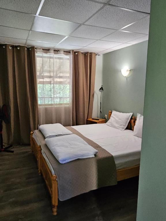 Postel nebo postele na pokoji v ubytování Orehite-Family Hotel ,Food & Pool