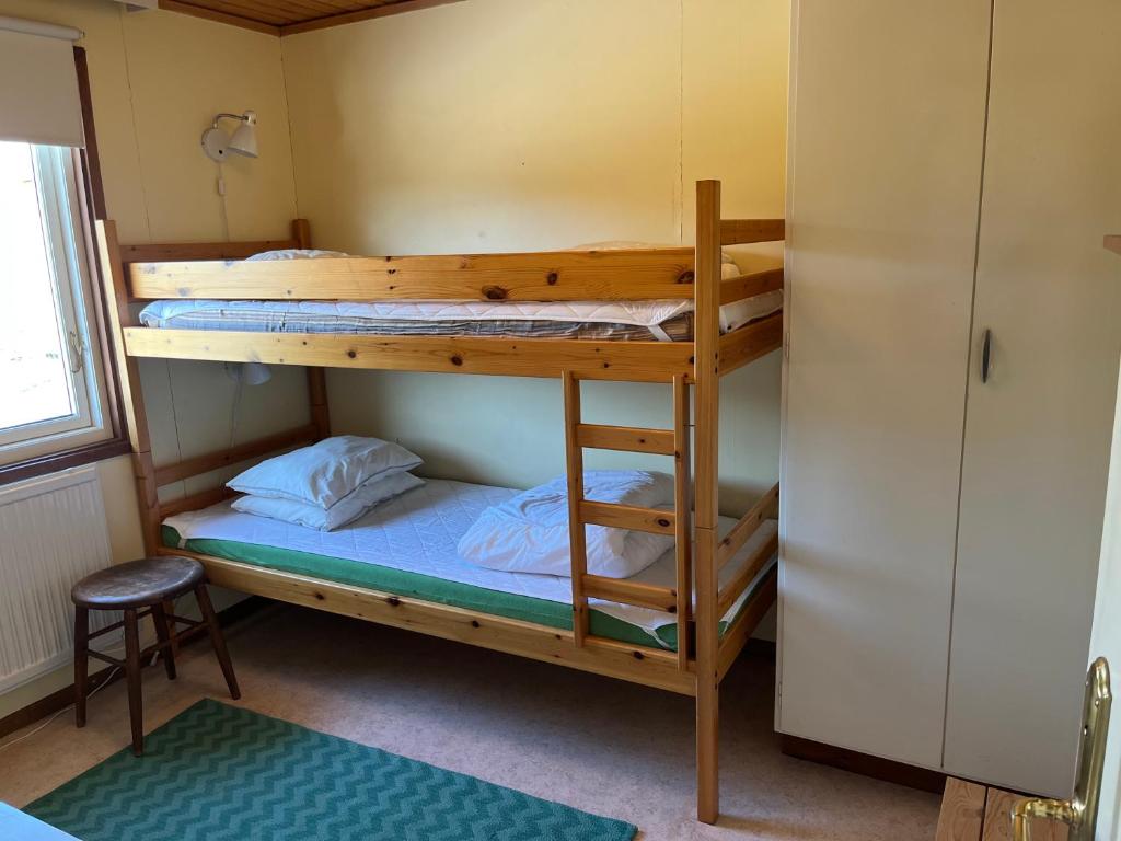 Postel nebo postele na pokoji v ubytování Hörlösa