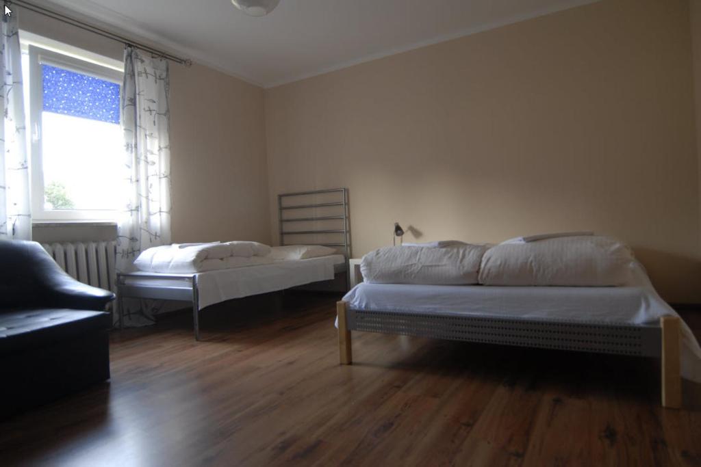Łóżko lub łóżka w pokoju w obiekcie Motel u Olka Boczów