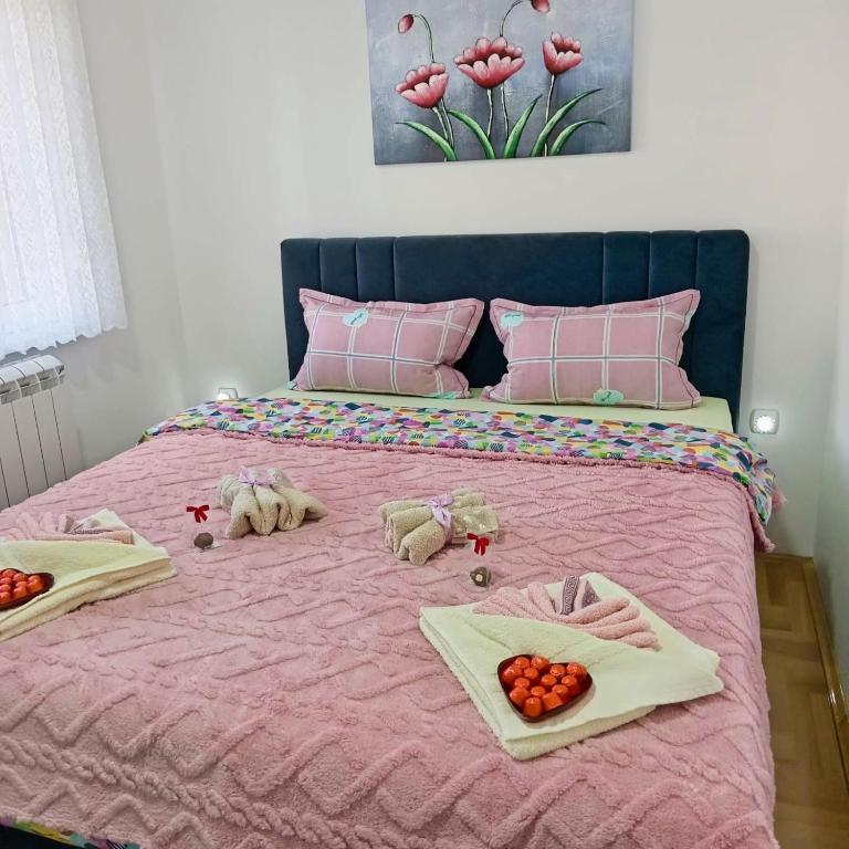 Postel nebo postele na pokoji v ubytování Apartman LARA