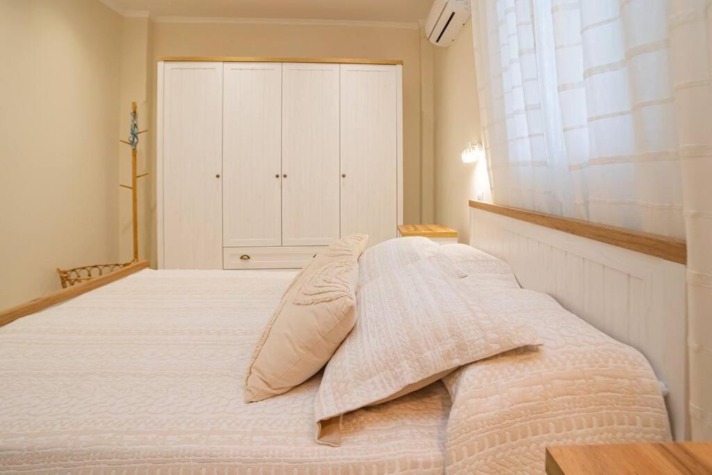 Postel nebo postele na pokoji v ubytování Casa Artemisia
