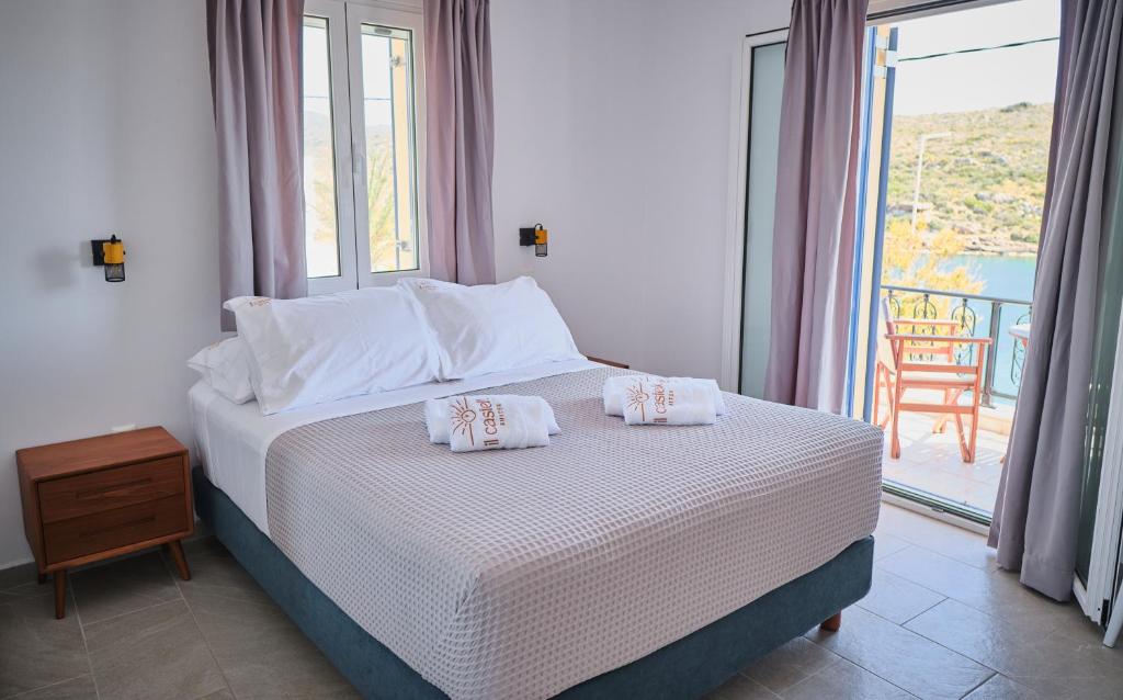 Postel nebo postele na pokoji v ubytování Il Castello Suites