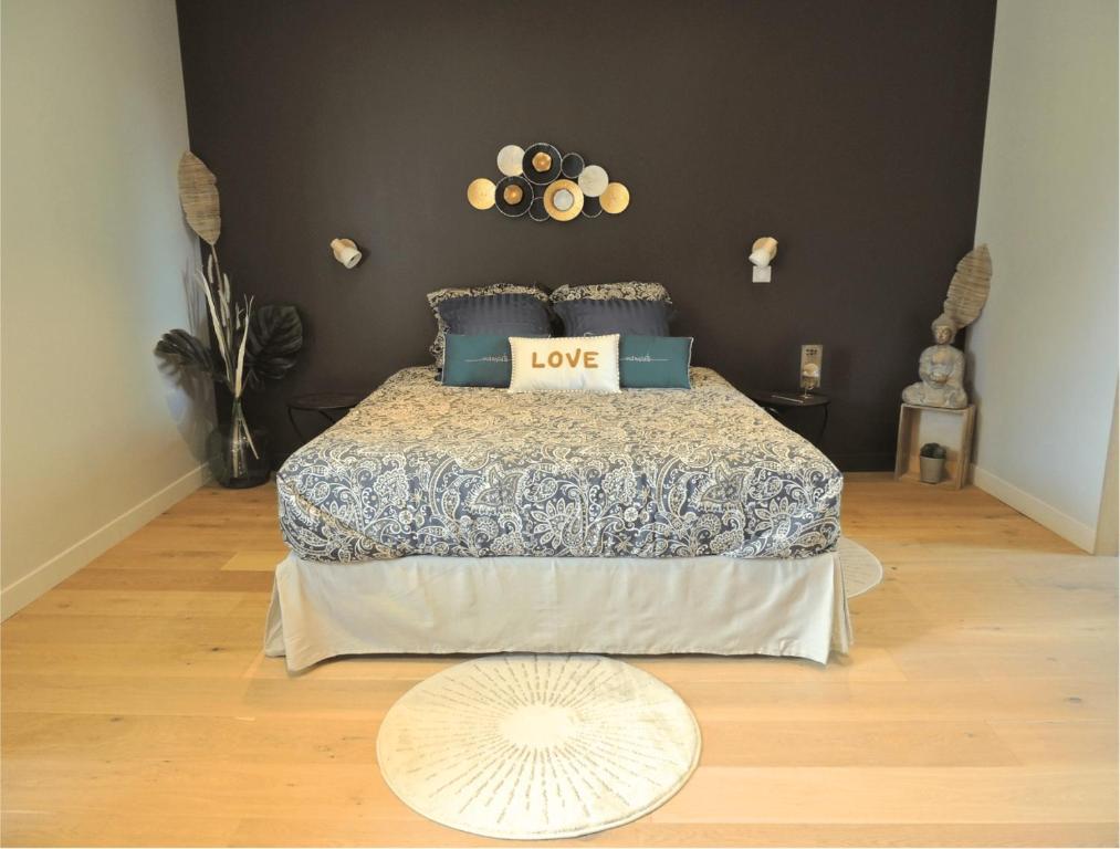 Postel nebo postele na pokoji v ubytování Céshap - Chambres d'hôtes avec Jacuzzi