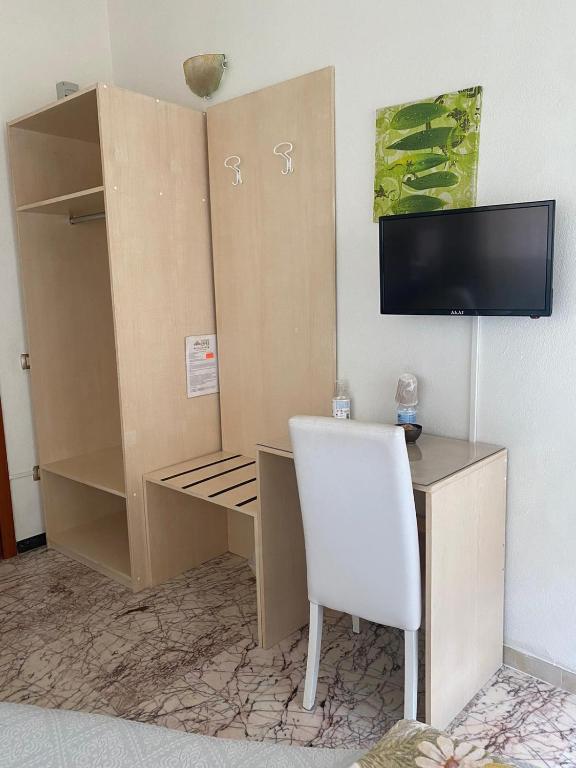 TV a/nebo společenská místnost v ubytování B&B Camera & Caffe