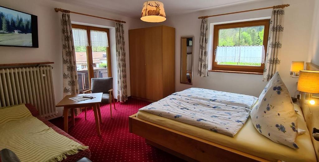 Postel nebo postele na pokoji v ubytování Haus Kehlstein