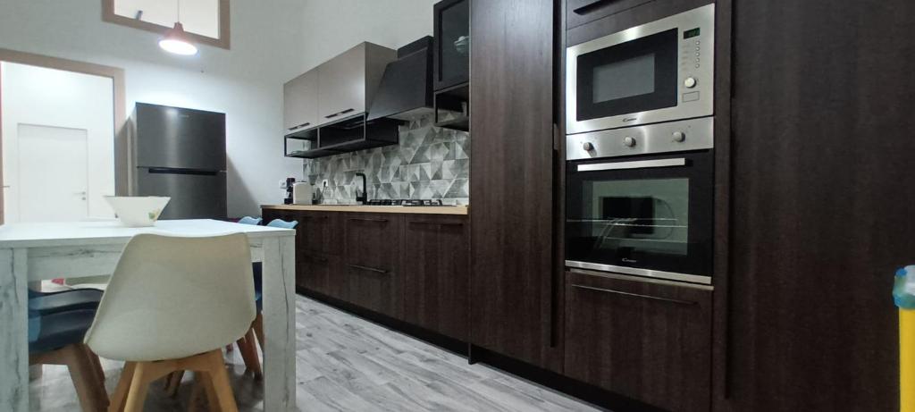 Kuchyň nebo kuchyňský kout v ubytování B&B Casa a Liu