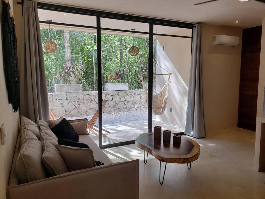 Area soggiorno di Little Oasis with private pool in the jungle