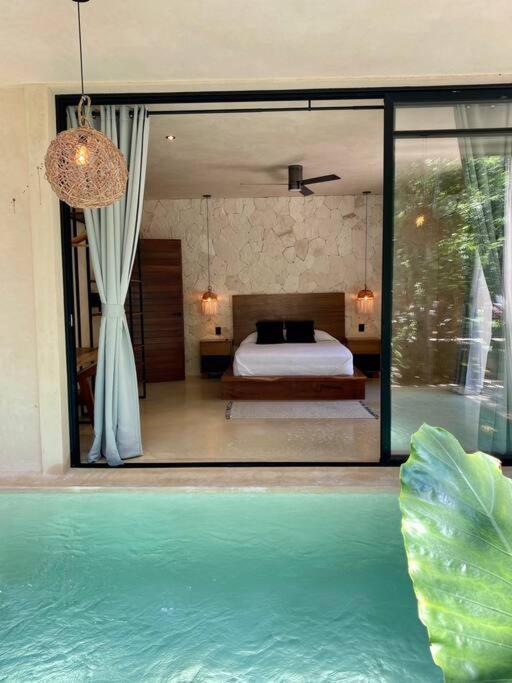 Letto o letti in una camera di Little Oasis with private pool in the jungle