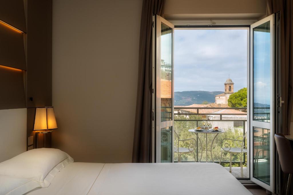 Llit o llits en una habitació de Sangallo Palace