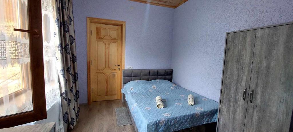 Llit o llits en una habitació de Dadu's Gelati