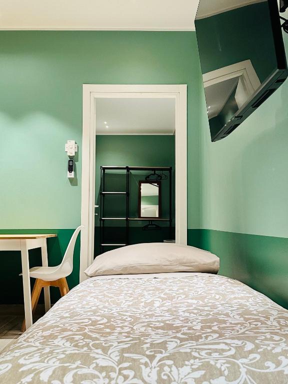 Postel nebo postele na pokoji v ubytování Mini Alloggi Alle Terme