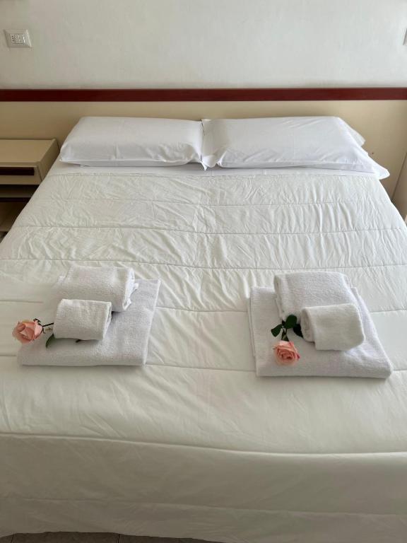 Postel nebo postele na pokoji v ubytování Due Gemelle
