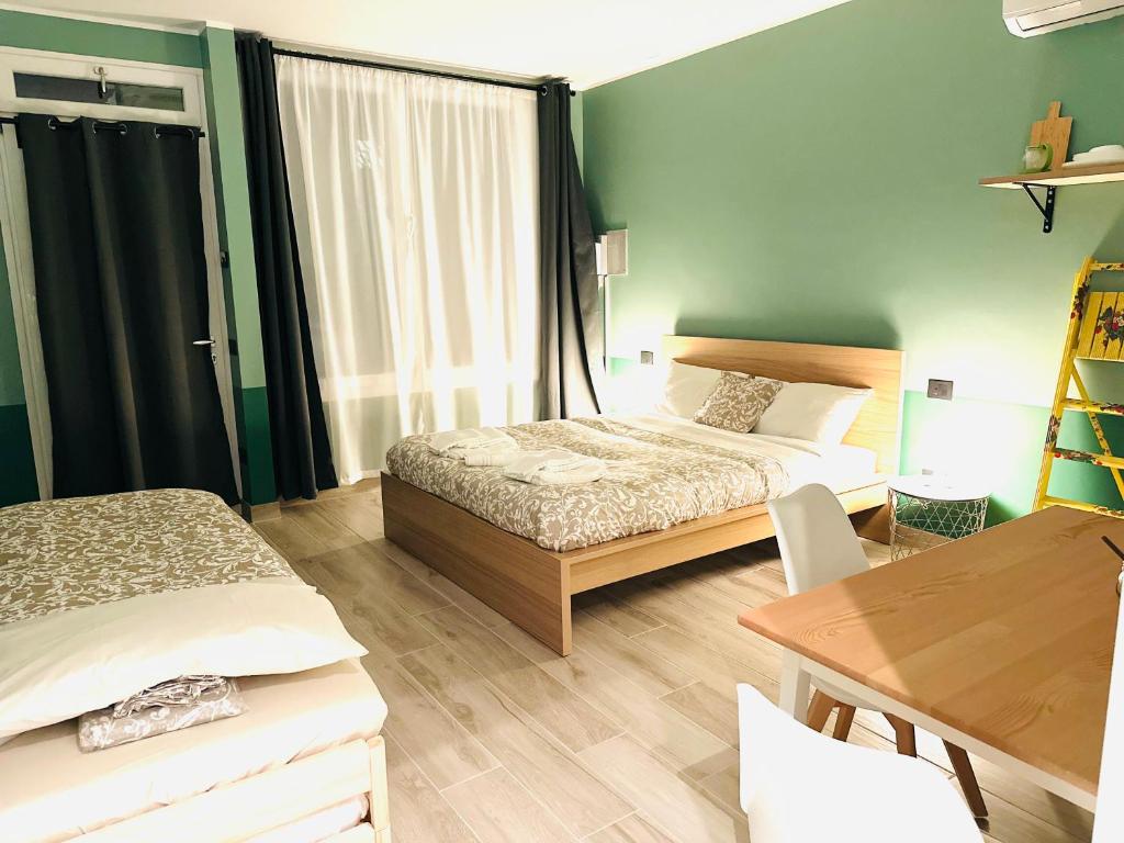 Postel nebo postele na pokoji v ubytování Mini Alloggi Alle Terme