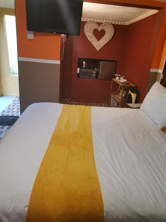 Postel nebo postele na pokoji v ubytování Lunganakho Country Lodge