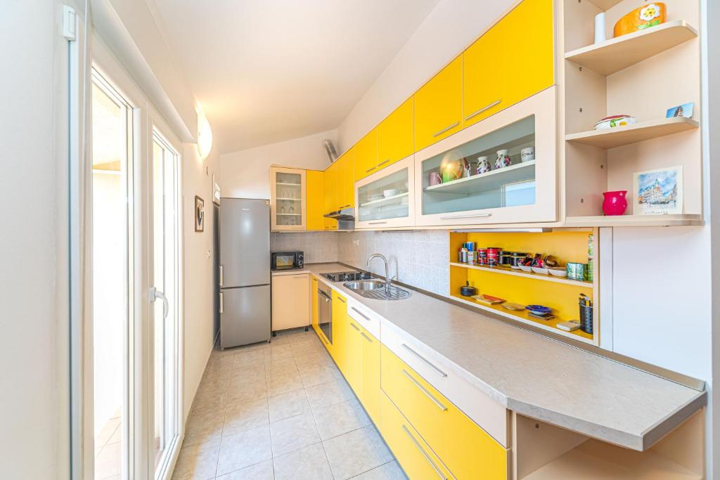 Kuchyň nebo kuchyňský kout v ubytování Apartments Iskra