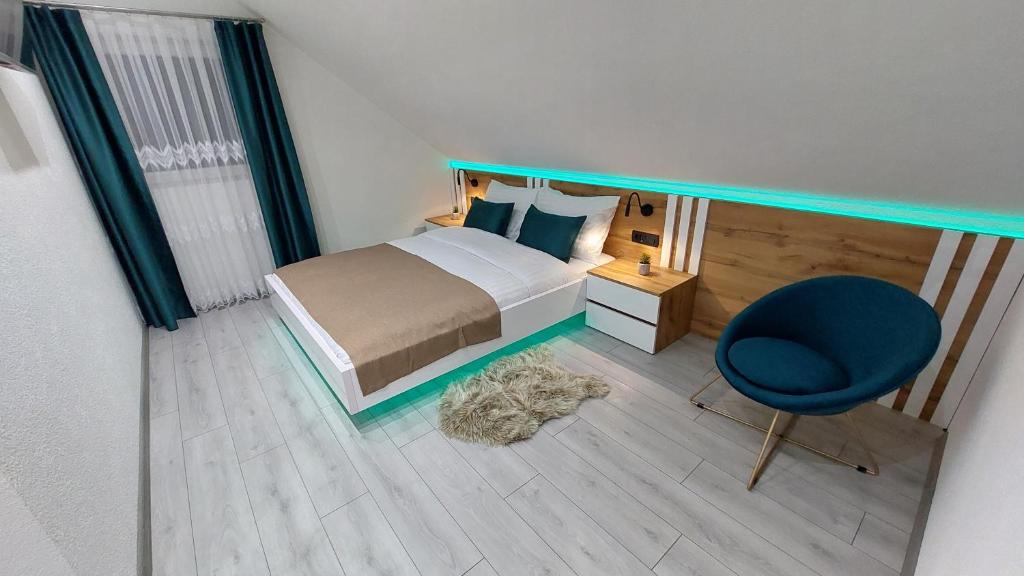 Posteľ alebo postele v izbe v ubytovaní Premier House by RD Group