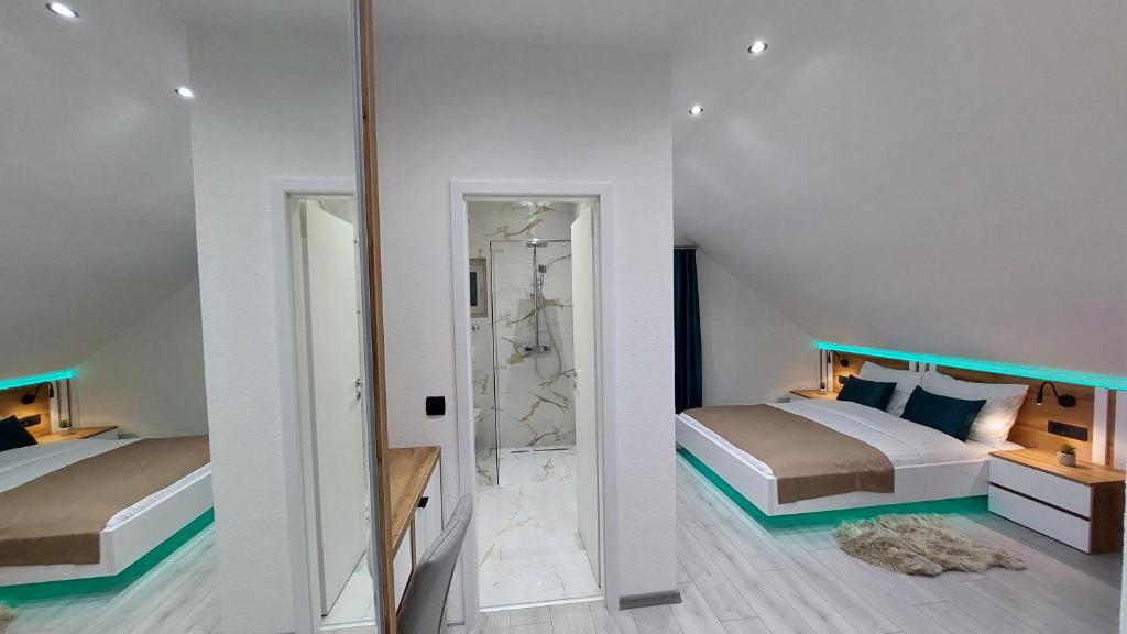 Posteľ alebo postele v izbe v ubytovaní Premier House by RD Group