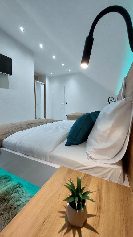 Posteľ alebo postele v izbe v ubytovaní Premier House by RD Group