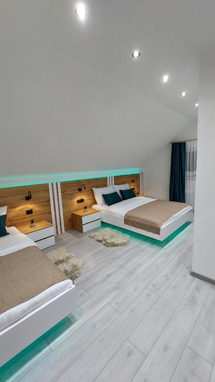 Posteľ alebo postele v izbe v ubytovaní Premier House by RD Group