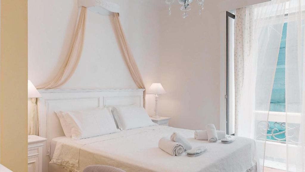 Posteľ alebo postele v izbe v ubytovaní The Koukaki Residence