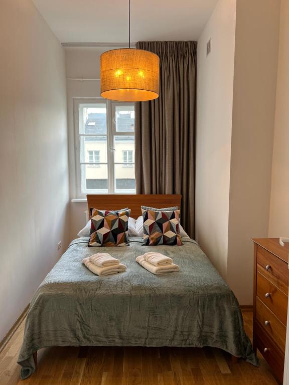 Postel nebo postele na pokoji v ubytování Apartamenty centrum