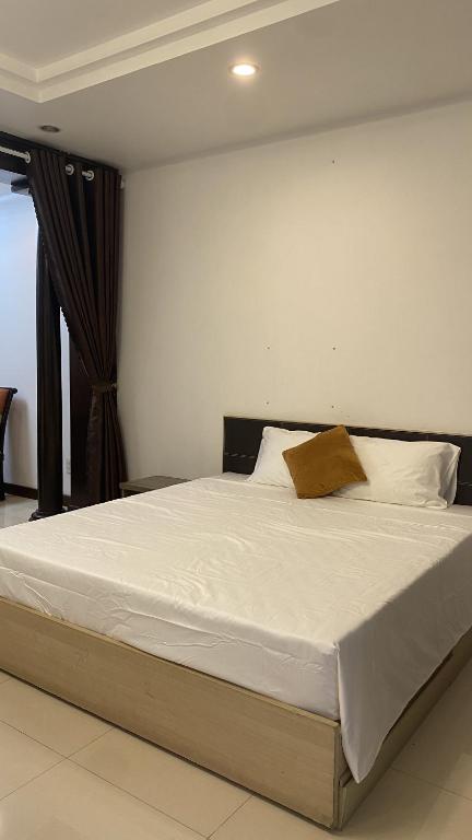 Postel nebo postele na pokoji v ubytování SOCHU HOUSE- Tuần Châu Homestay & Coffee