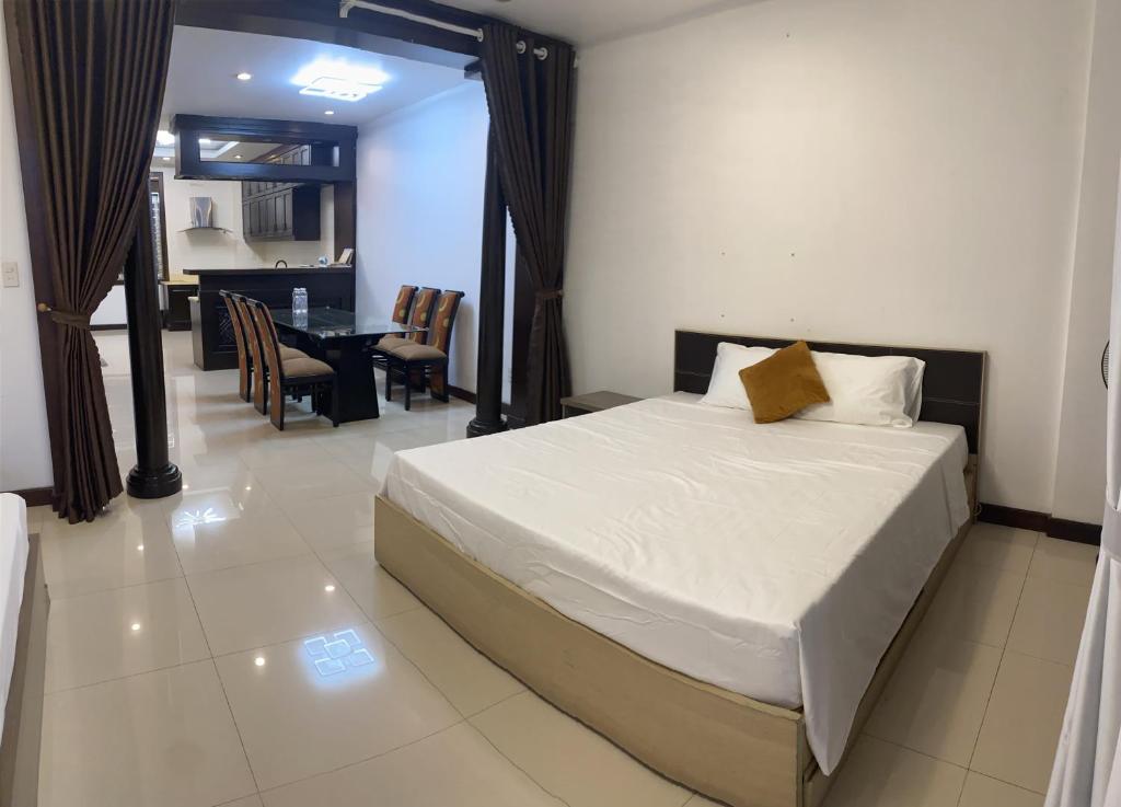 Postel nebo postele na pokoji v ubytování SOCHU HOUSE- Tuần Châu Homestay & Coffee