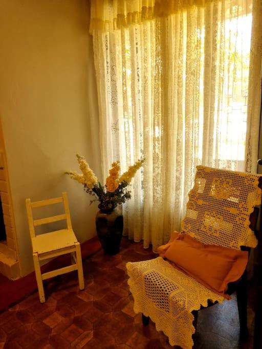 Postel nebo postele na pokoji v ubytování Autêntica Casa da Vó