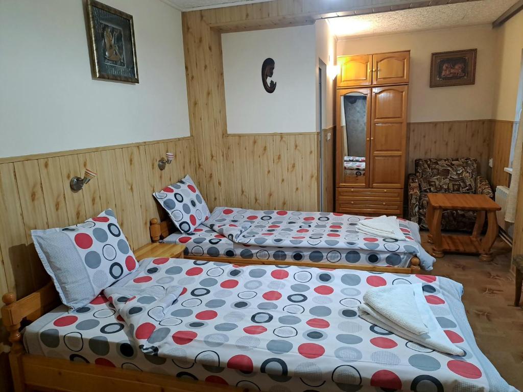 Postel nebo postele na pokoji v ubytování Kovacha Guest House
