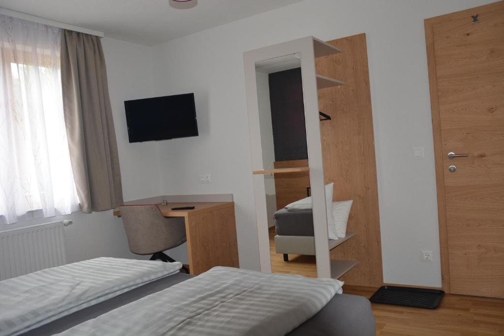 Postel nebo postele na pokoji v ubytování Pletz