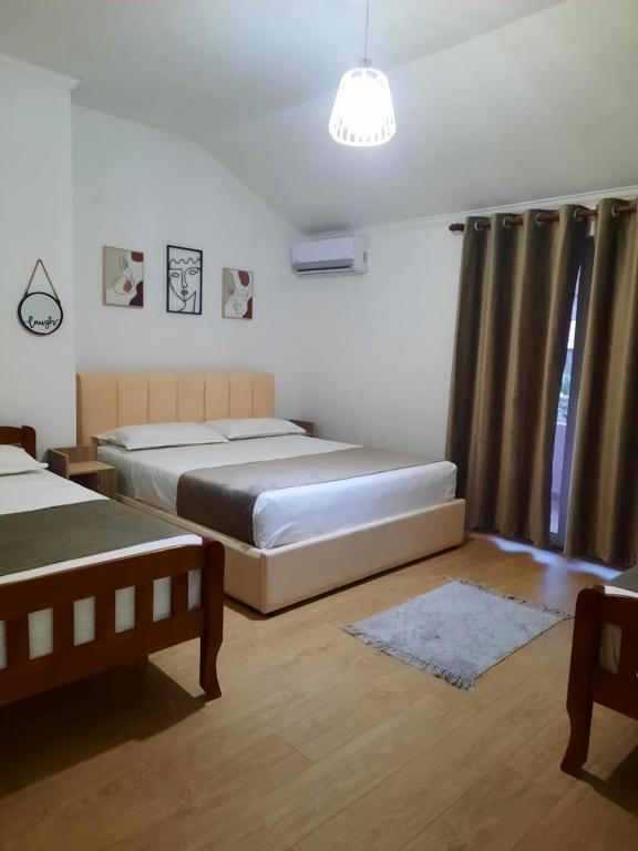Voodi või voodid majutusasutuse Vila M Vera Rooms with kitchen and Apartments toas
