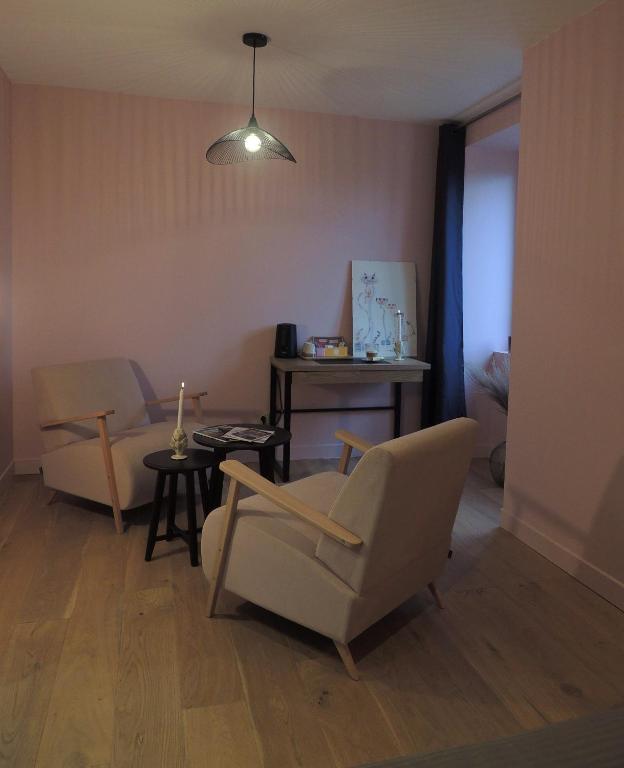 Posezení v ubytování Céshap - Chambres d'hôtes avec Jacuzzi