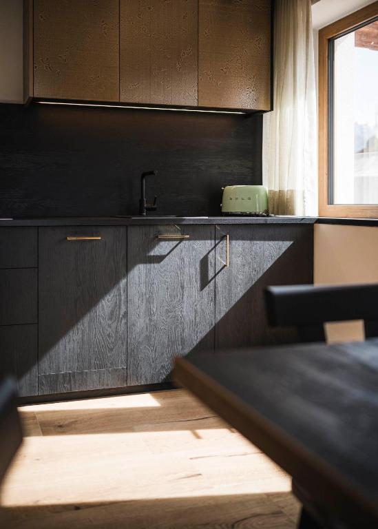 Kuchyň nebo kuchyňský kout v ubytování Pension Haus Tirol