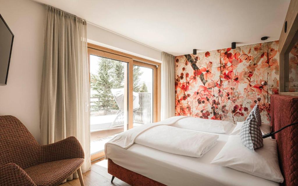 Postel nebo postele na pokoji v ubytování Pension Haus Tirol