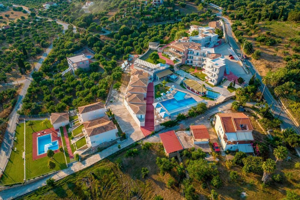 an aerial view of a large house with a yard at Panorama Resort in Finikounta