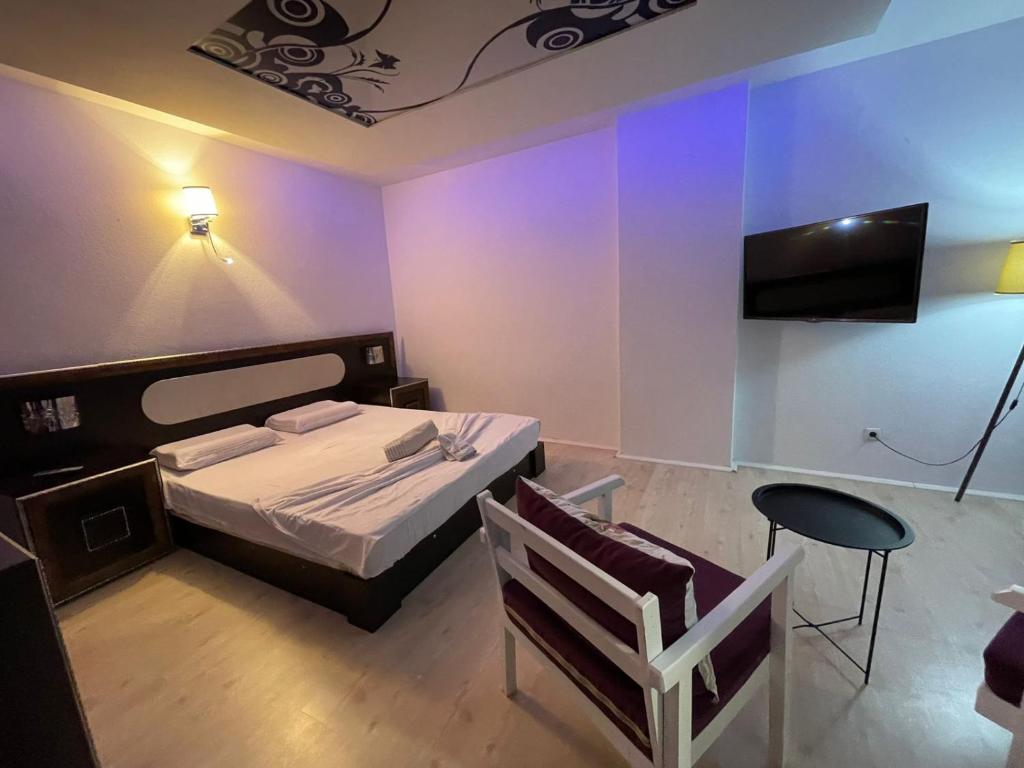 Postel nebo postele na pokoji v ubytování Deni house