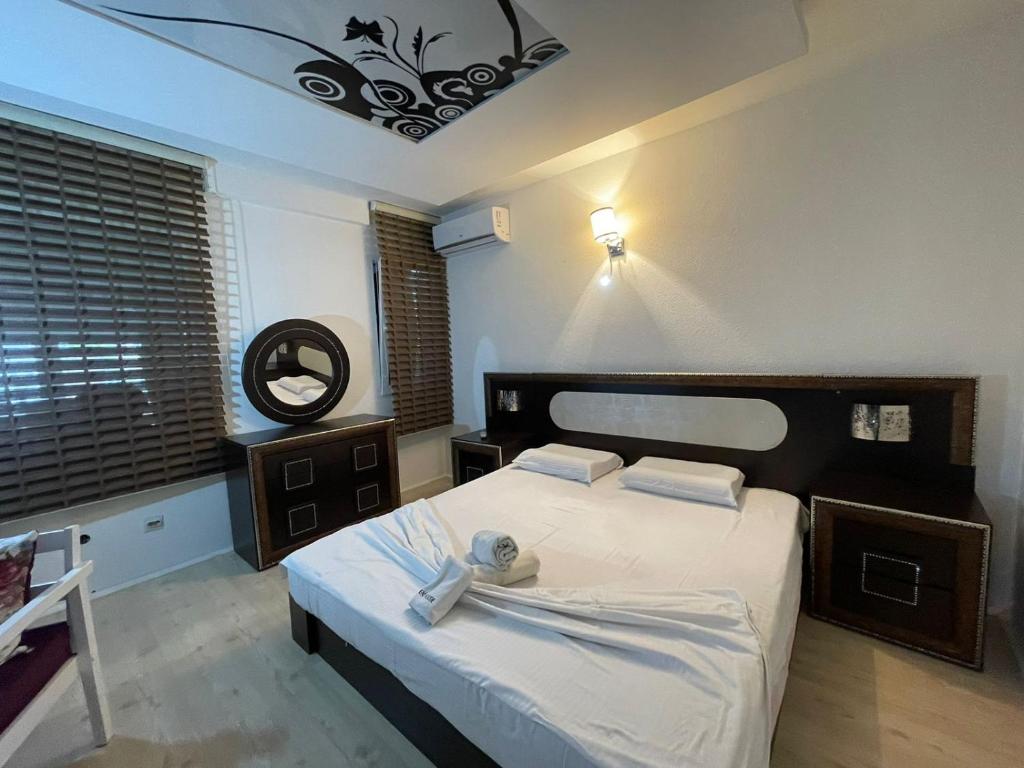 Postel nebo postele na pokoji v ubytování Deni house