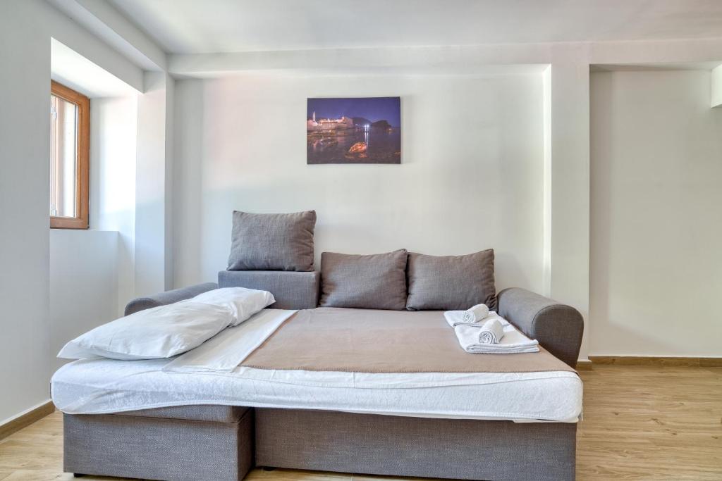 Postel nebo postele na pokoji v ubytování Apartments Pavic