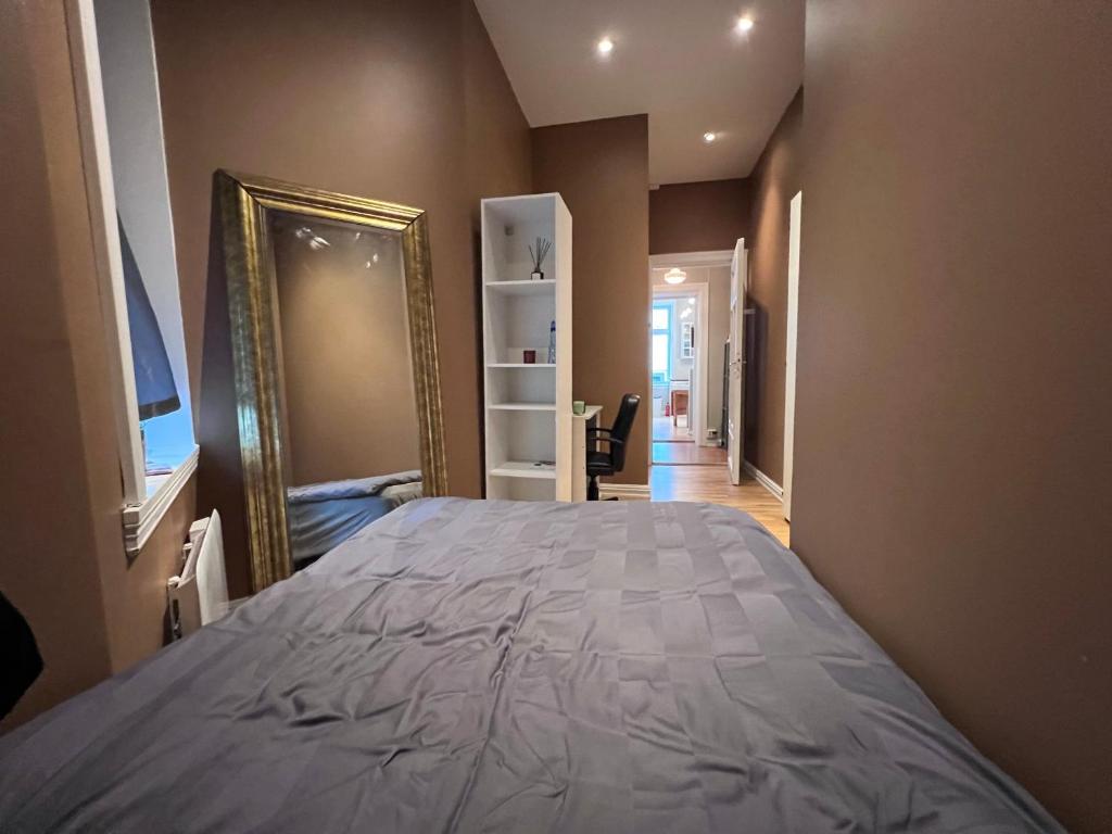 Ένα ή περισσότερα κρεβάτια σε δωμάτιο στο Private room Happy Days Bislett Stadion