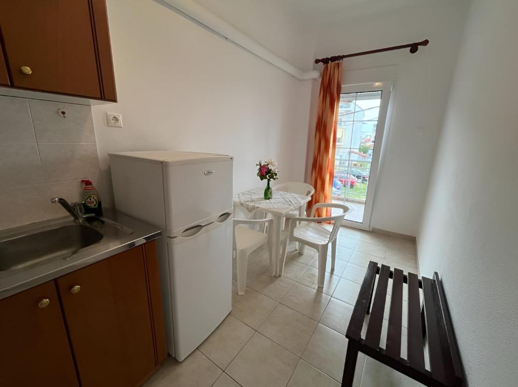 Kuchyň nebo kuchyňský kout v ubytování Chrysa Rooms