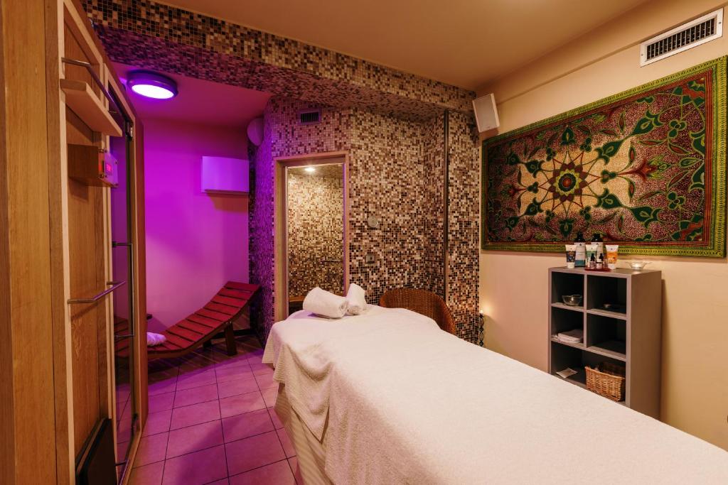 Postel nebo postele na pokoji v ubytování Hotel Dei Vicari