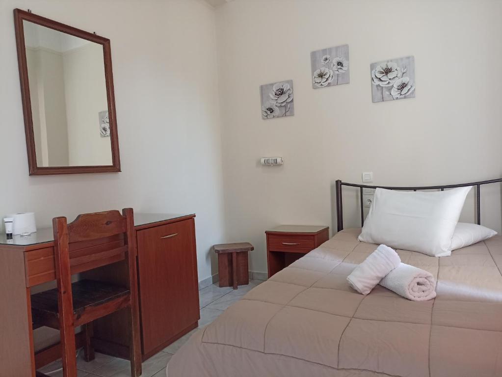 Postel nebo postele na pokoji v ubytování Elite Hotel